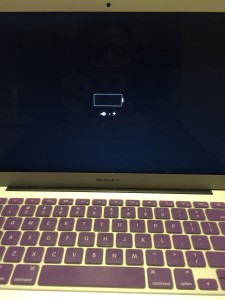 Sad little neglected cute purple laptop